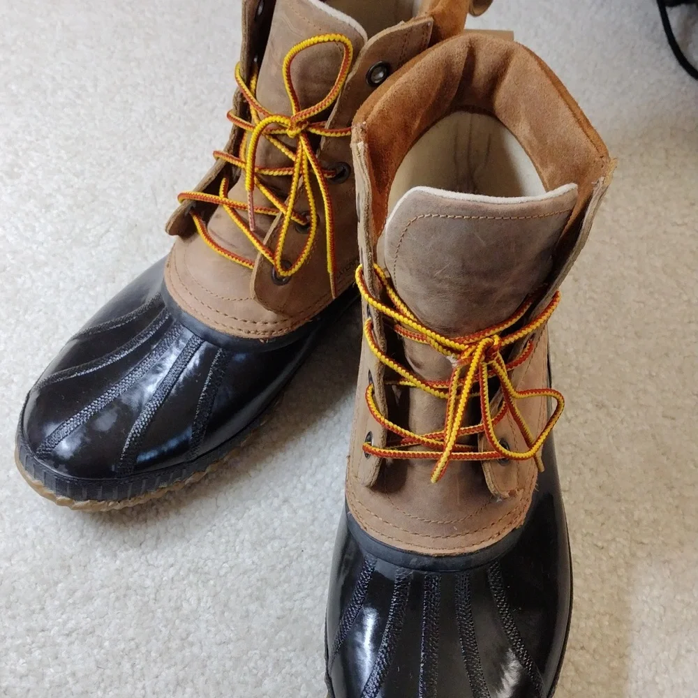 Sorel men's black rubber & tan leather winter boots. Size 11.5